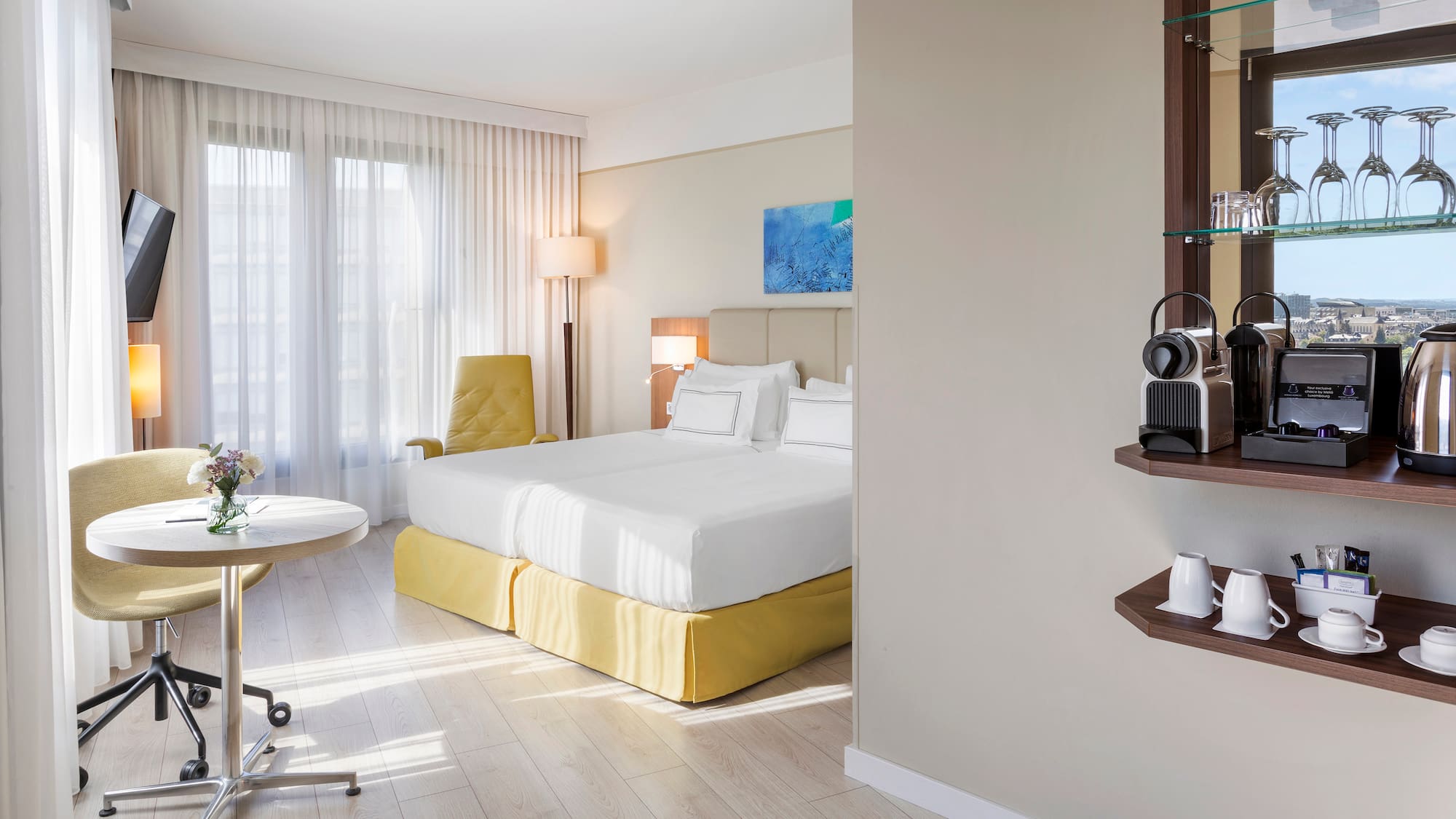 a room with a bed and a desk