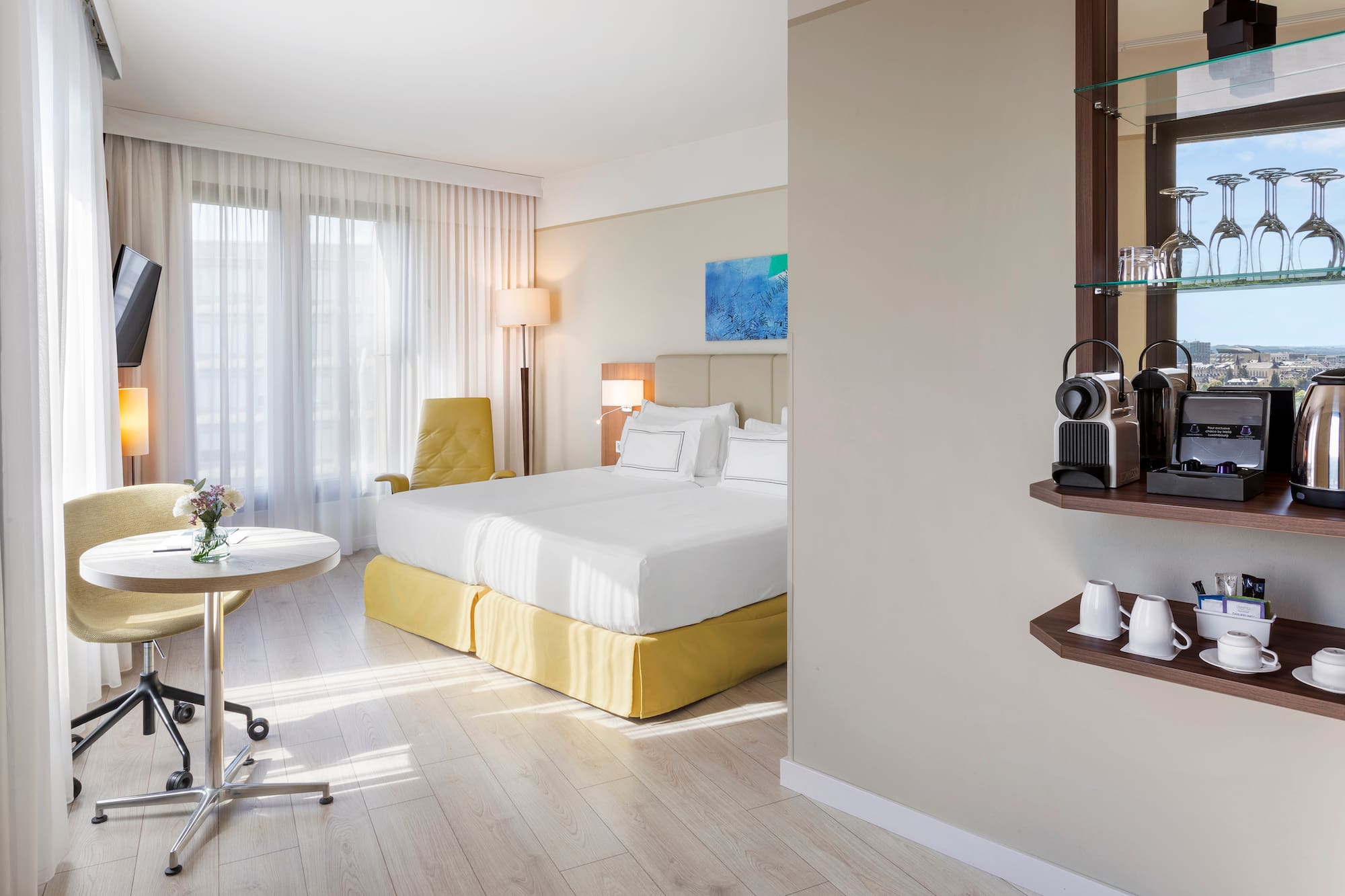 a room with a bed and a desk