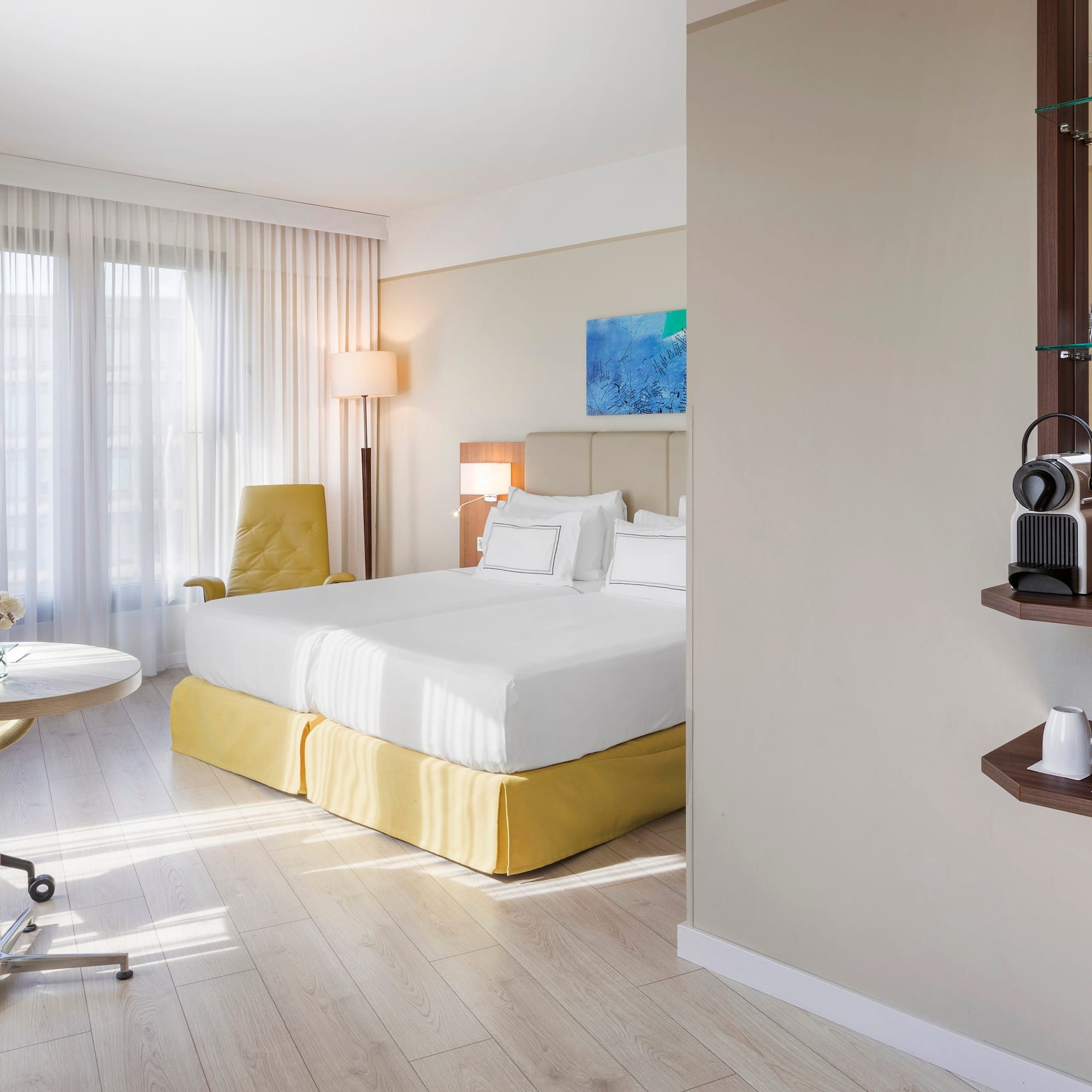 a room with a bed and a desk