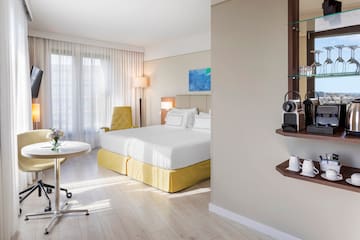 a room with a bed and a desk