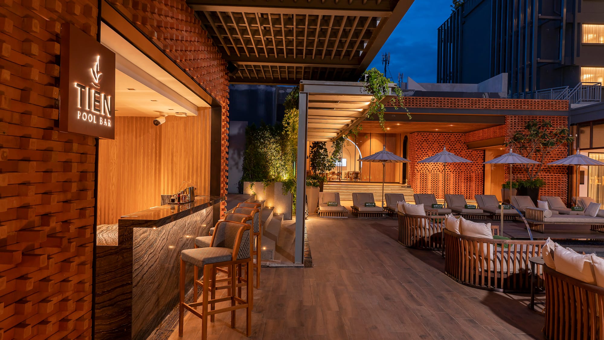 a patio with chairs and tables