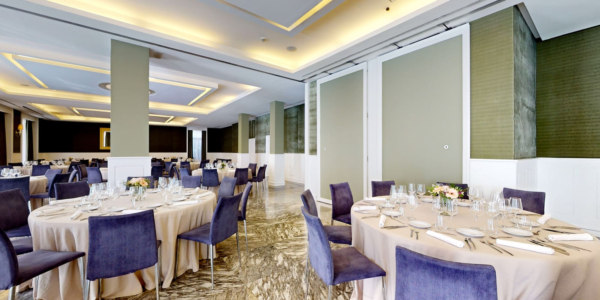 a room with tables and chairs