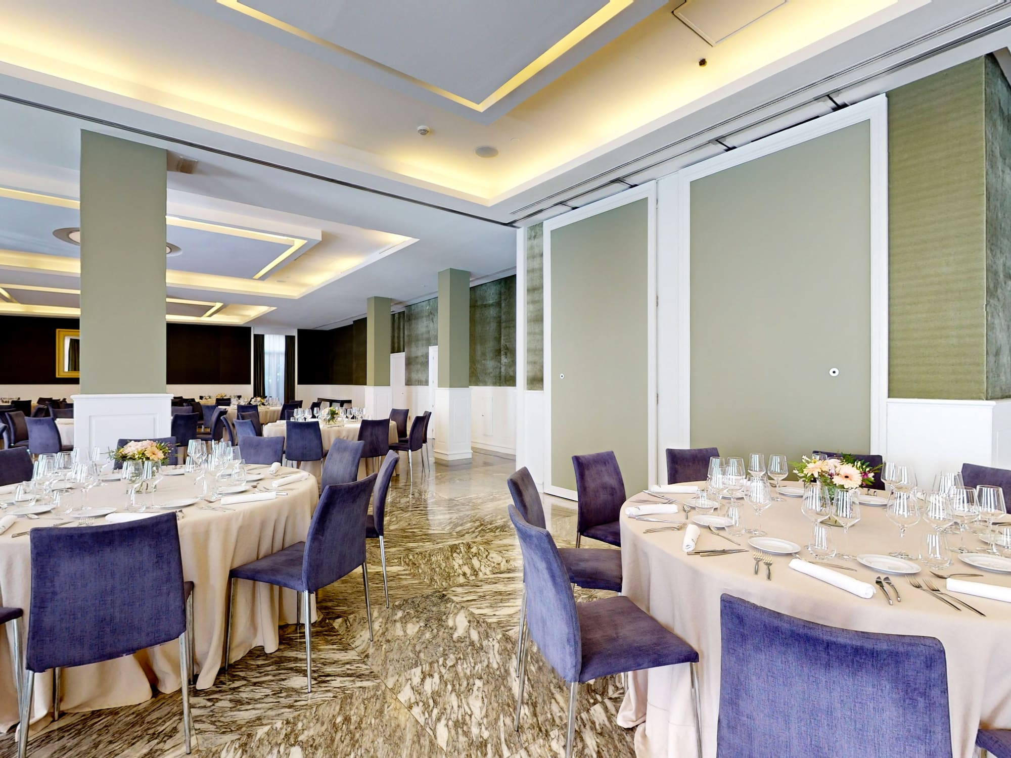 a room with tables and chairs