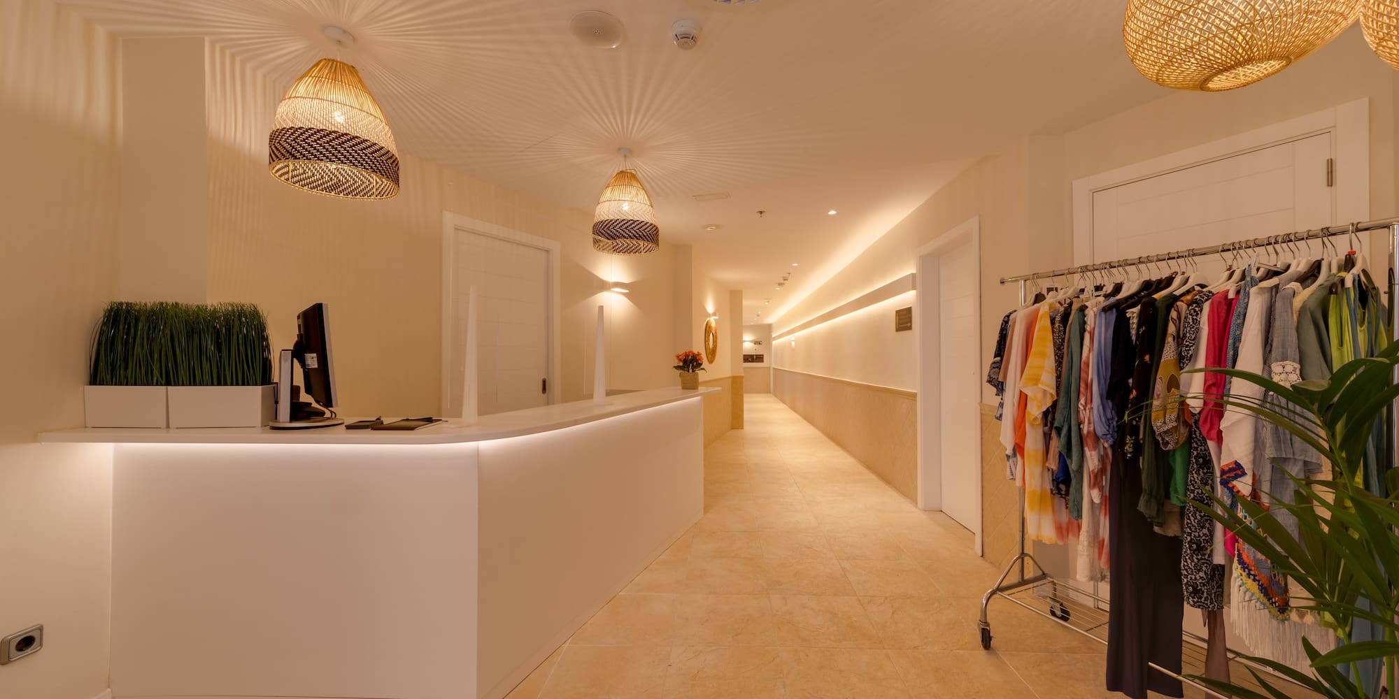 a store with a counter and clothes