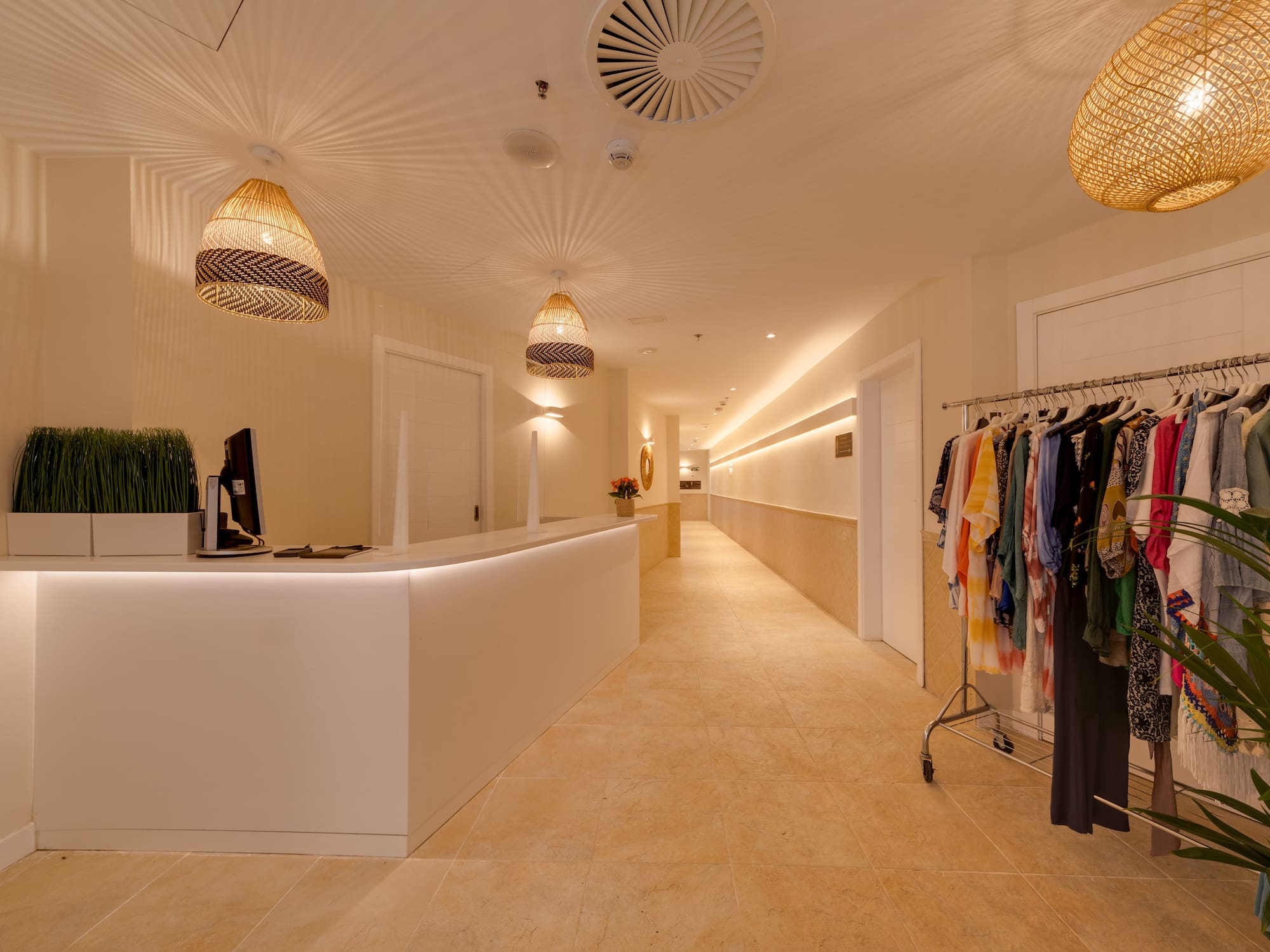 a store with a counter and clothes