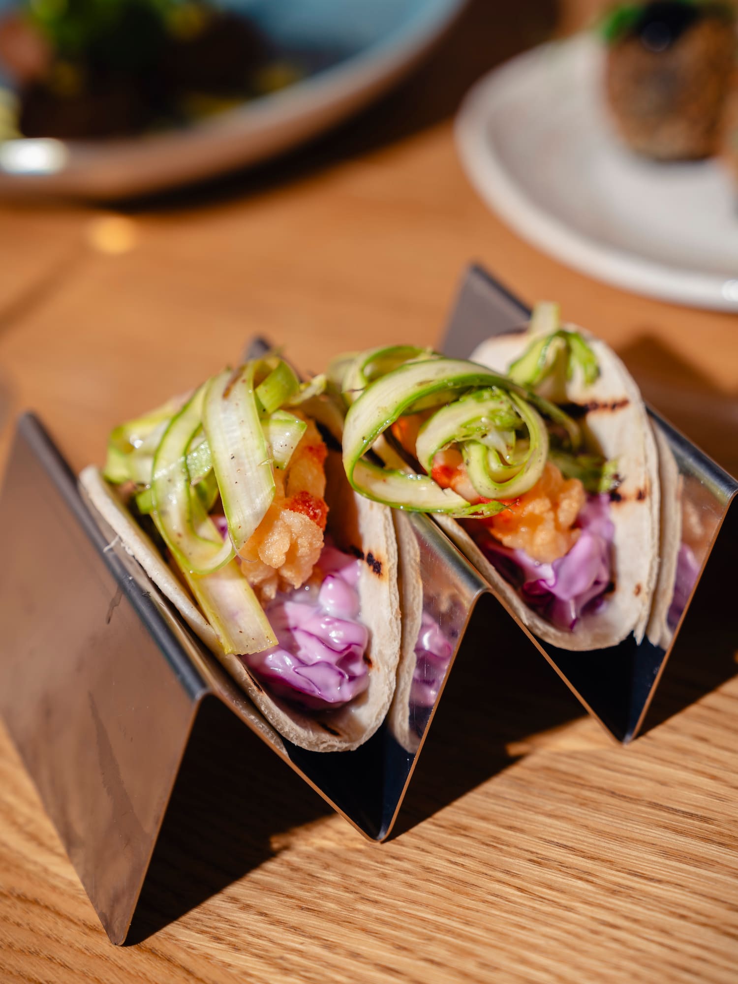 a group of tacos on a table