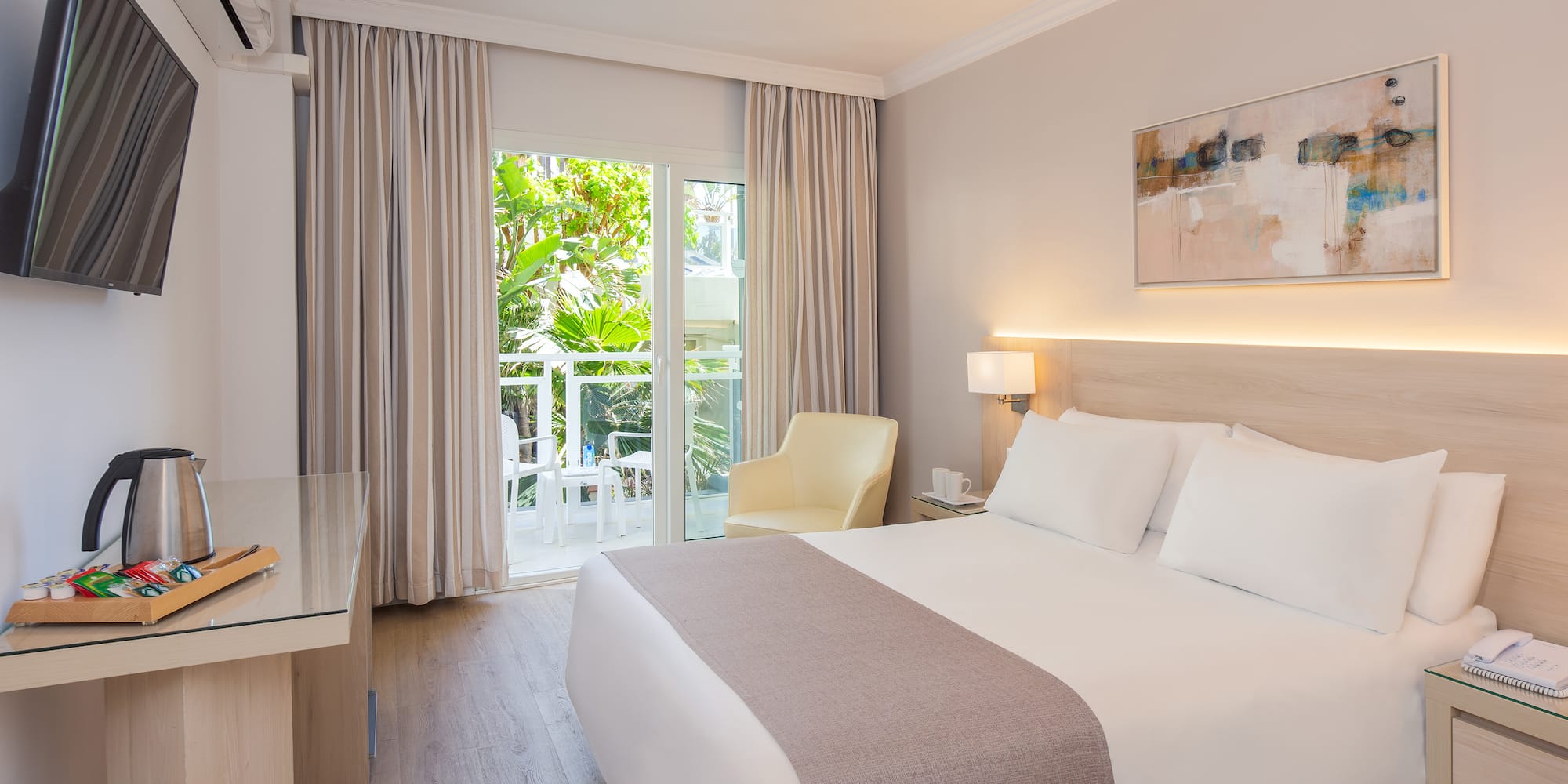 a bedroom with a bed and a desk