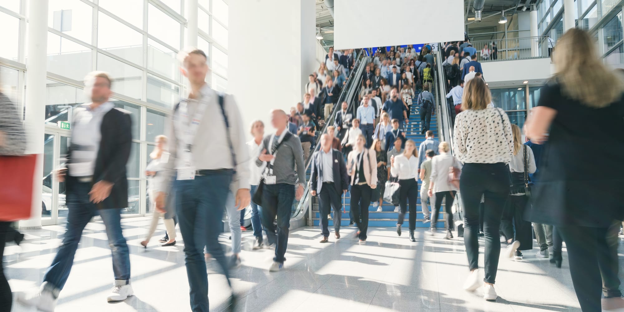 a group of people walking up stairs