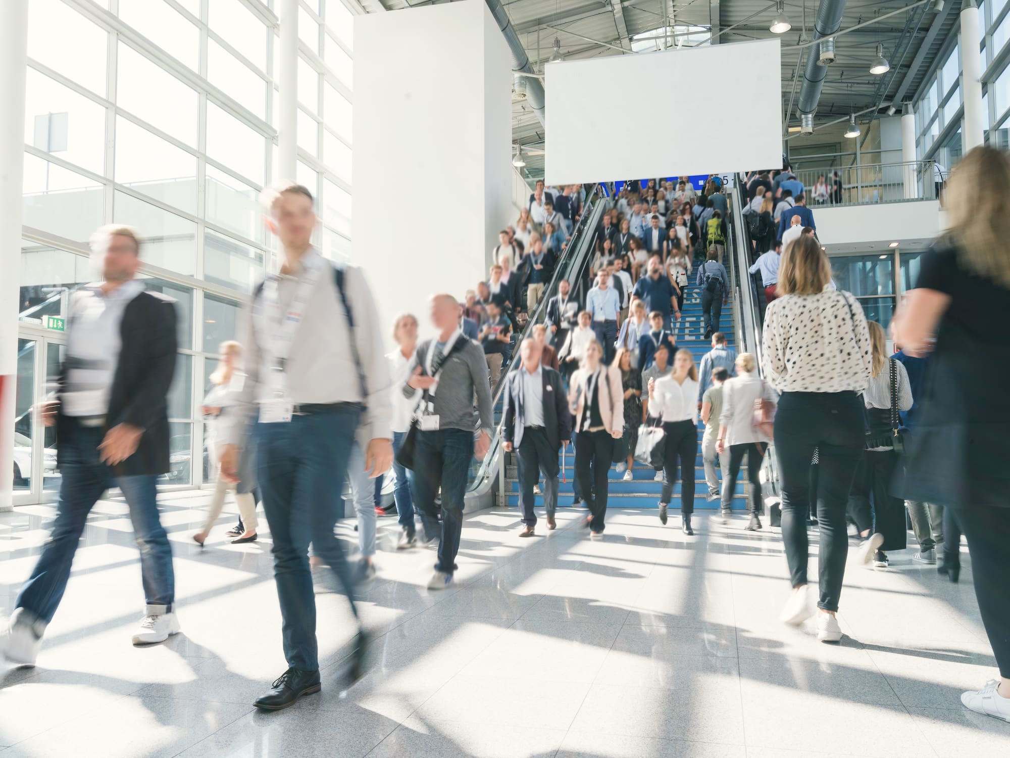 a group of people walking up stairs