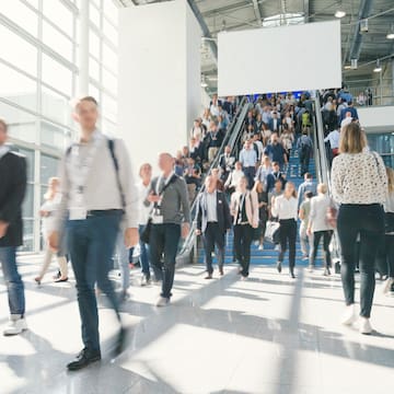 a group of people walking up stairs