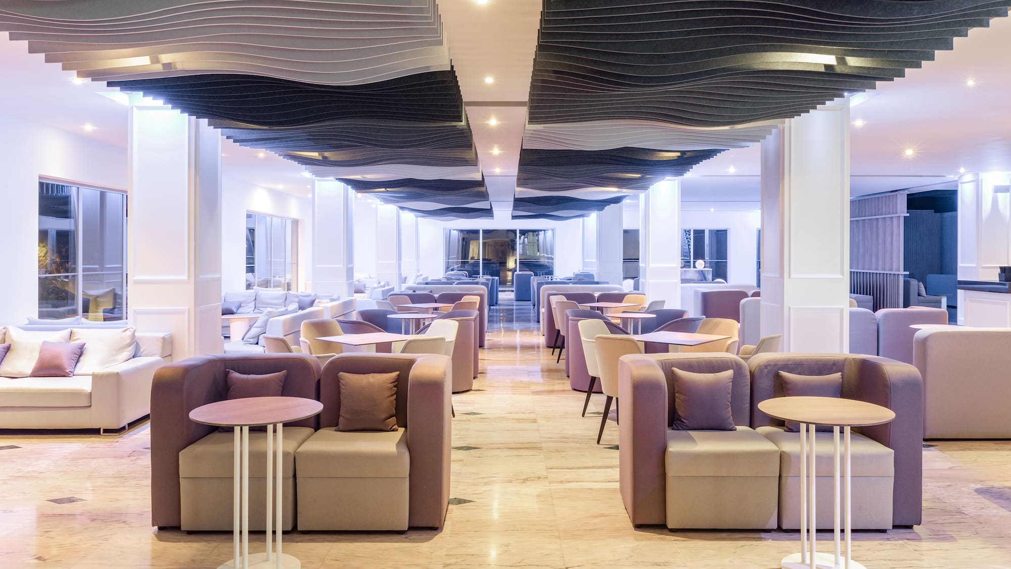 a room with tables and chairs