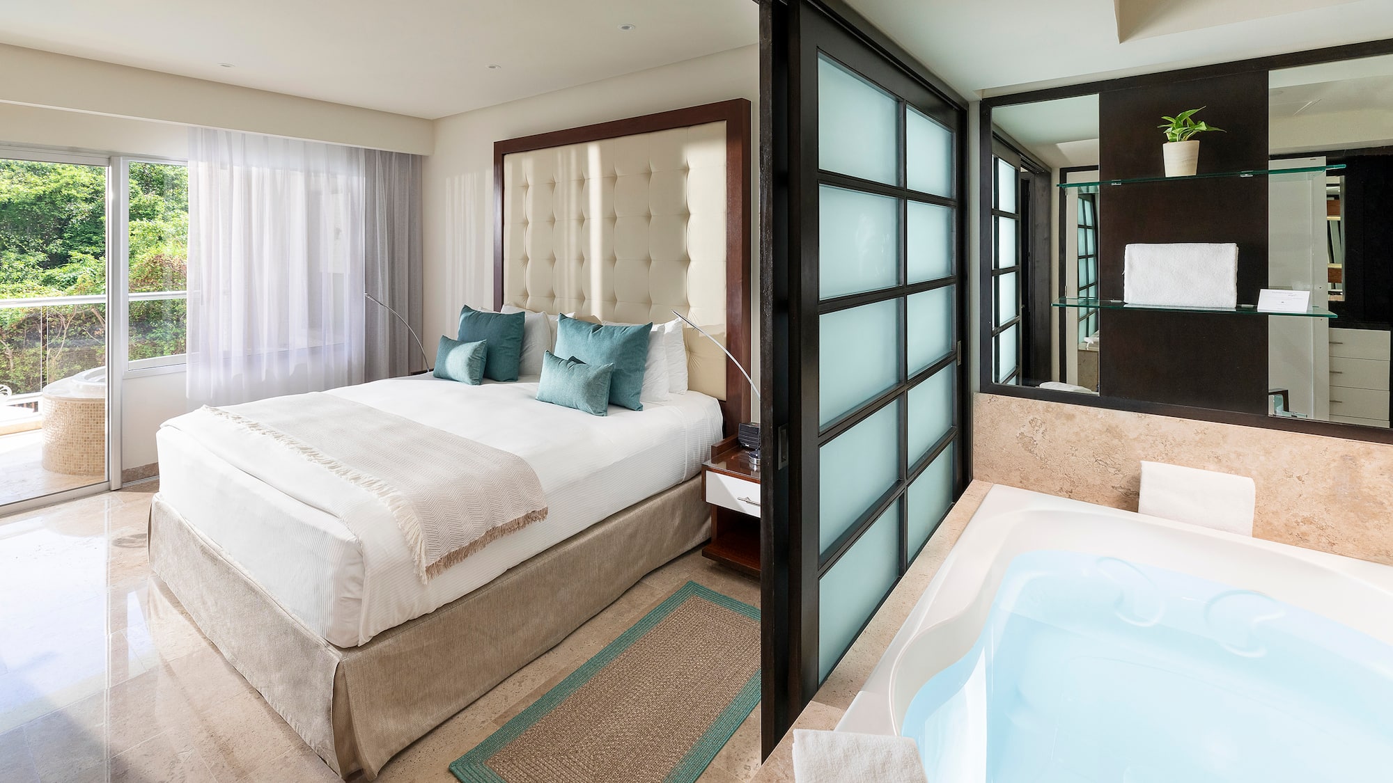a room with a bed and a bathtub