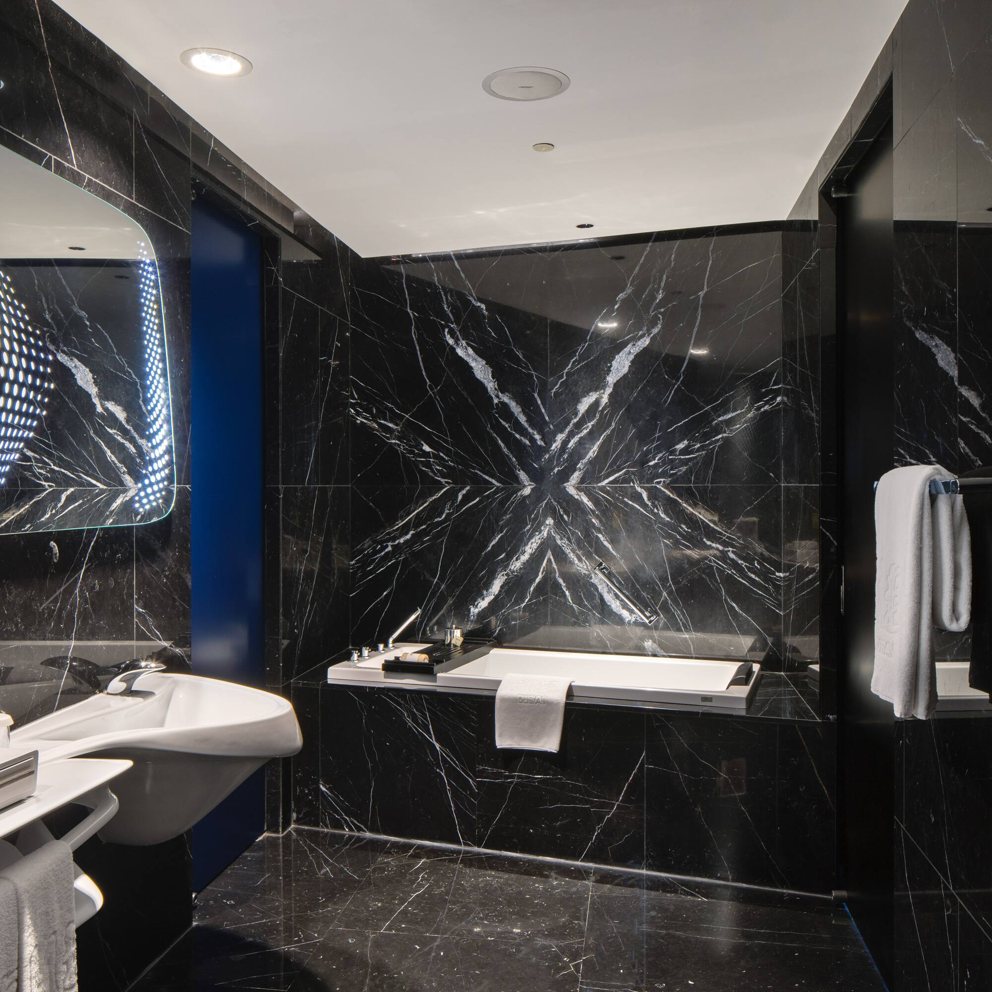 a bathroom with a sink and a bathtub