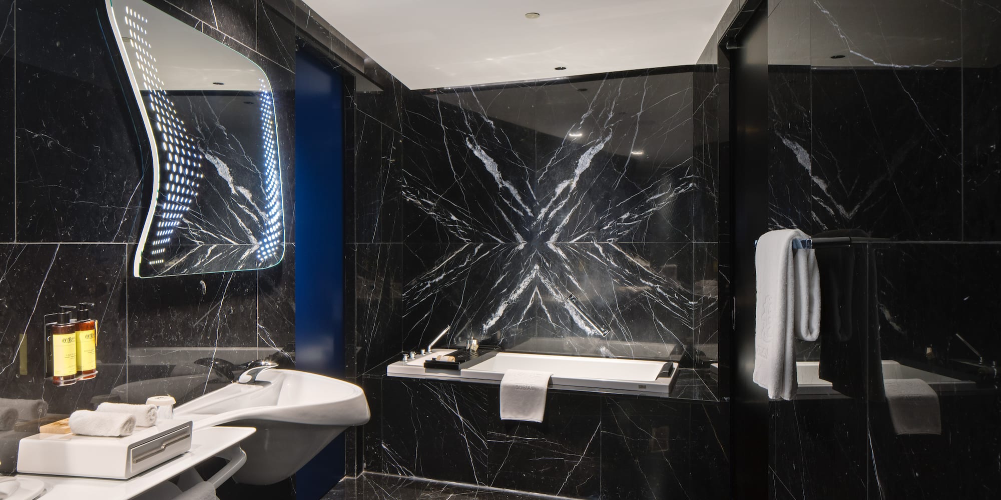 a bathroom with a sink and a bathtub