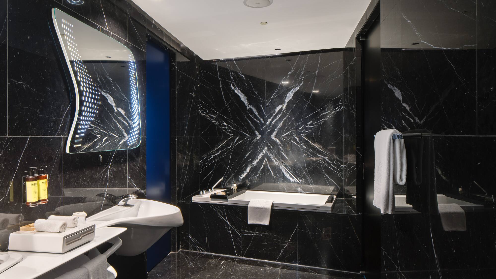 a bathroom with a sink and a bathtub