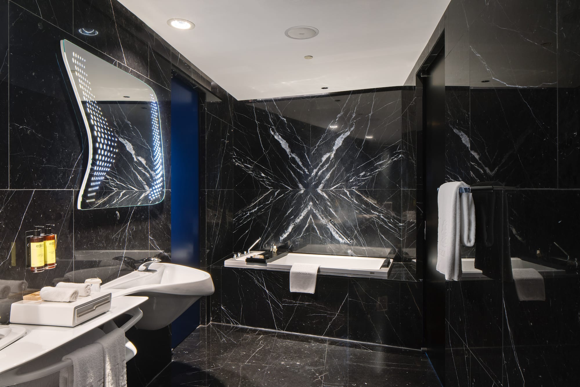 a bathroom with a sink and a bathtub