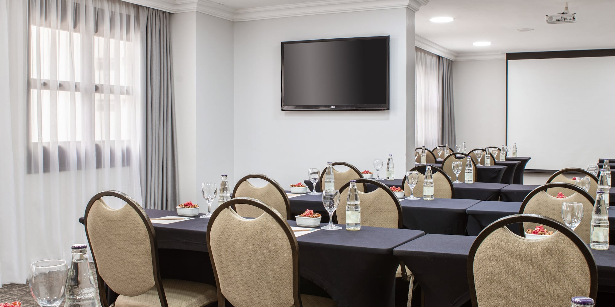 a room with tables and chairs