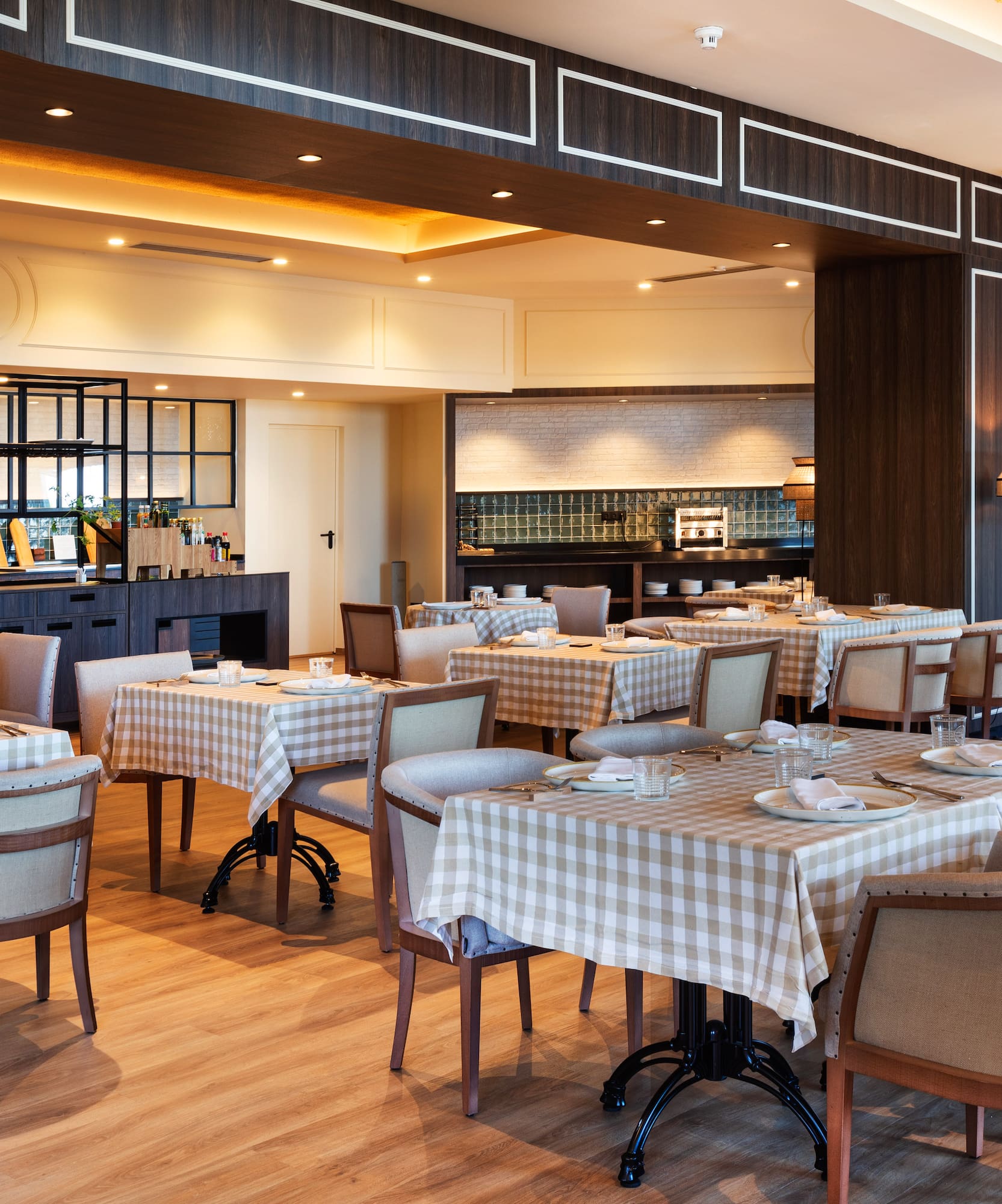 a restaurant with tables and chairs