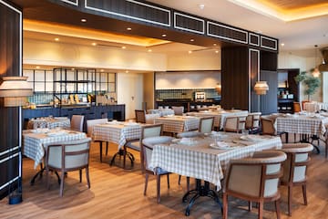 a restaurant with tables and chairs