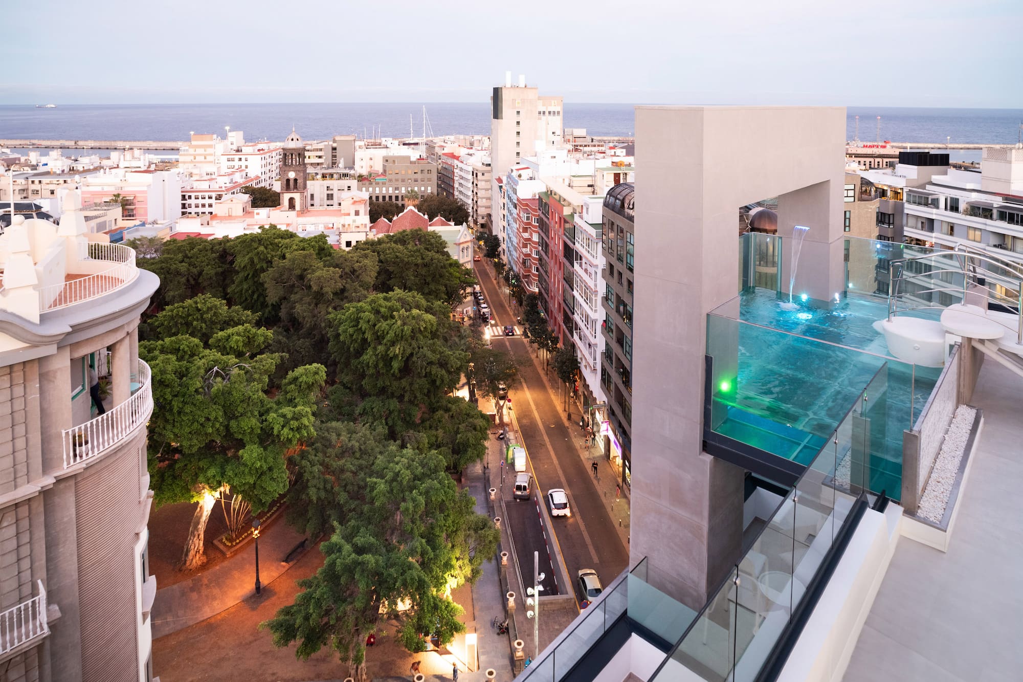 a city street with trees and buildings