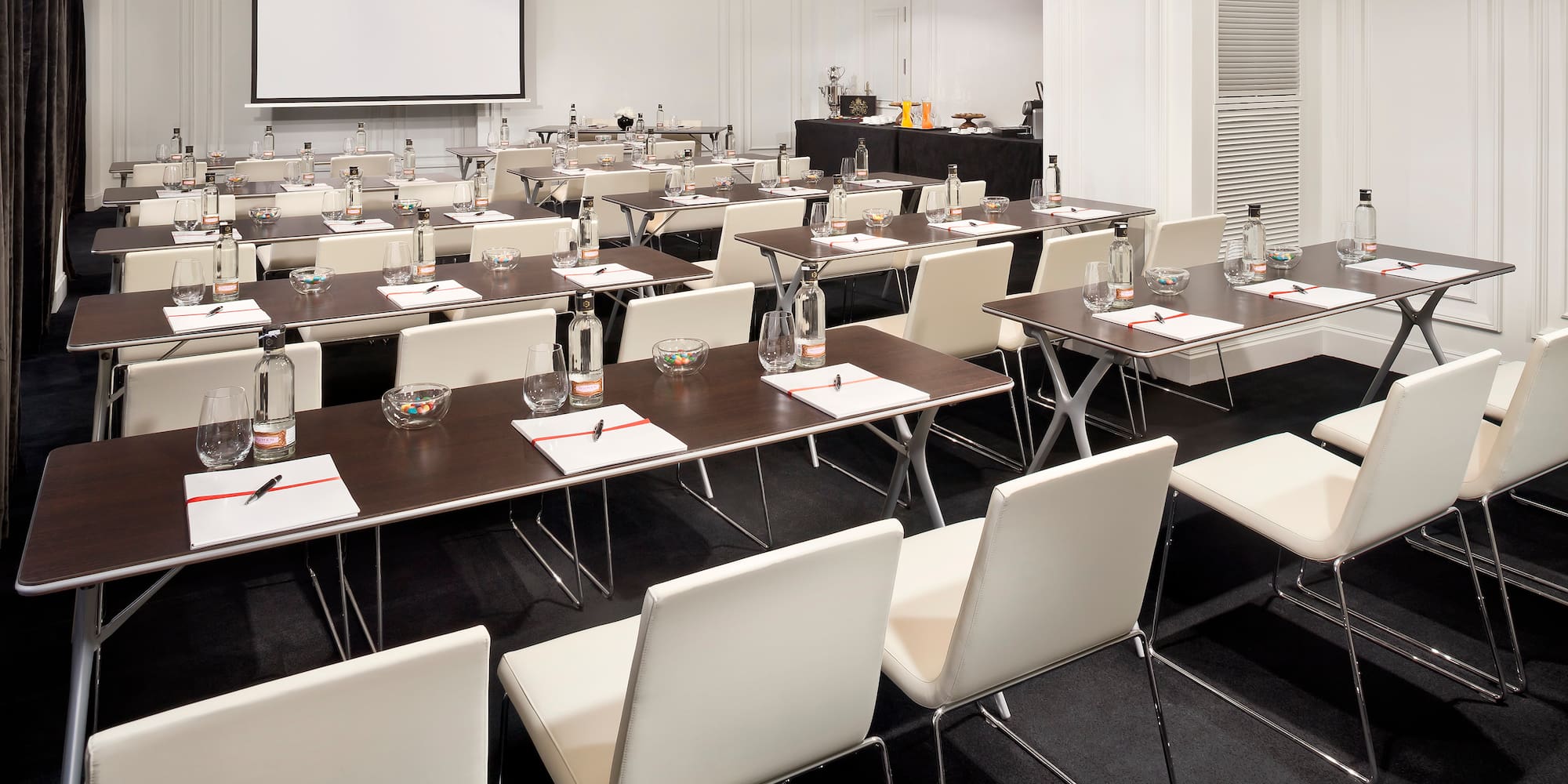 a room with tables and chairs