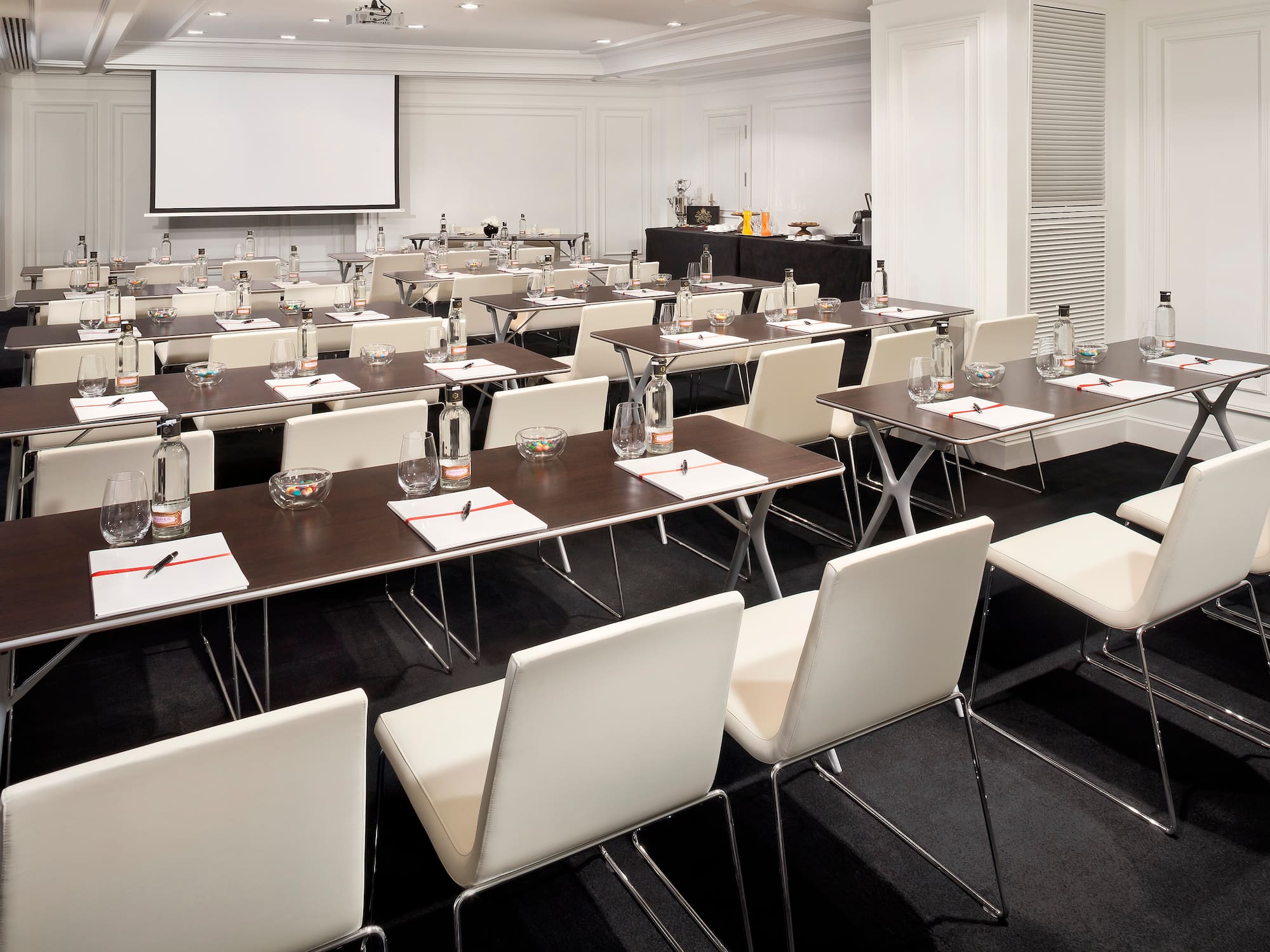 a room with tables and chairs
