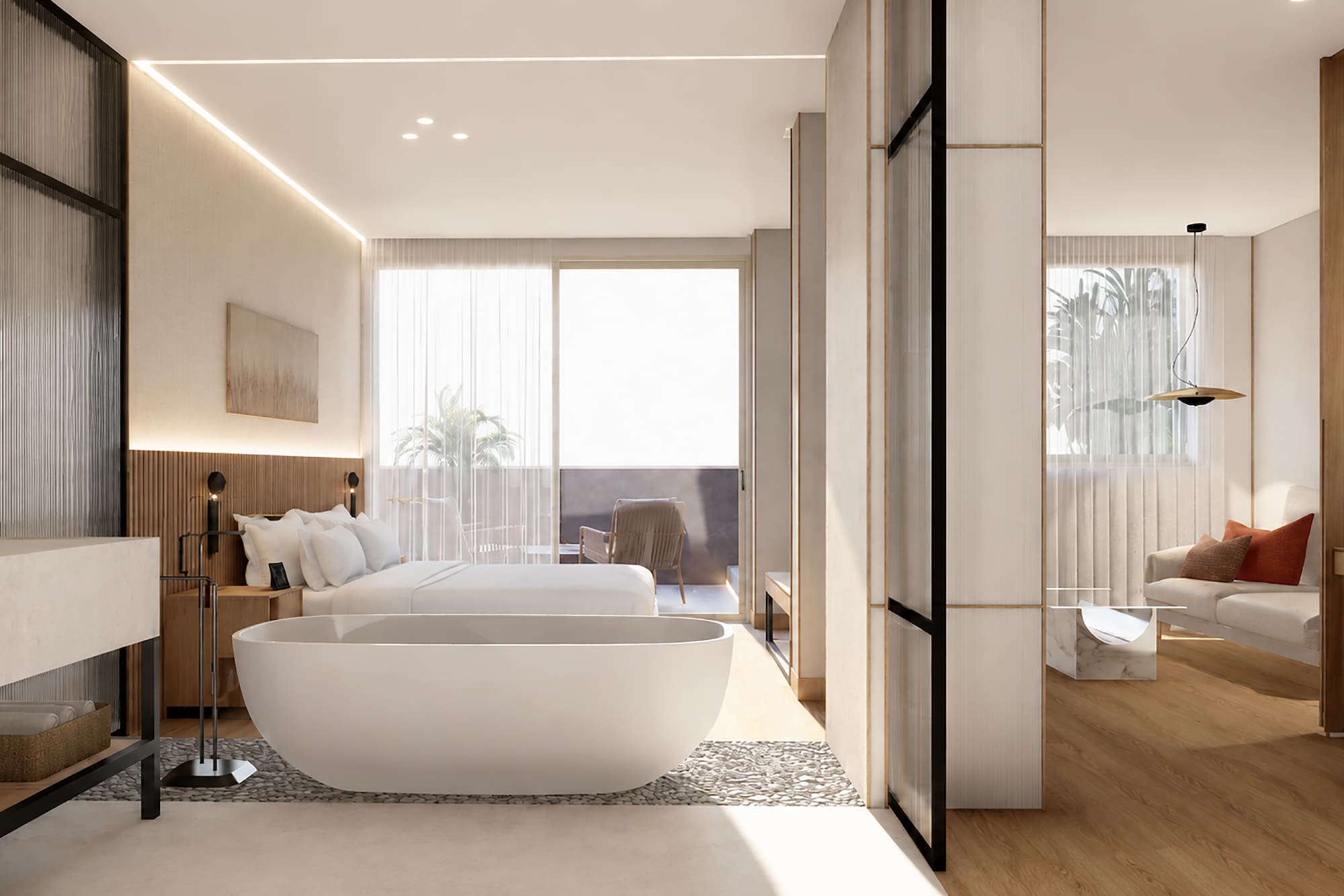 Modern luxury hotel suite with bedroom, freestanding tub, and balcony living area.