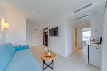 a room with a couch and a table