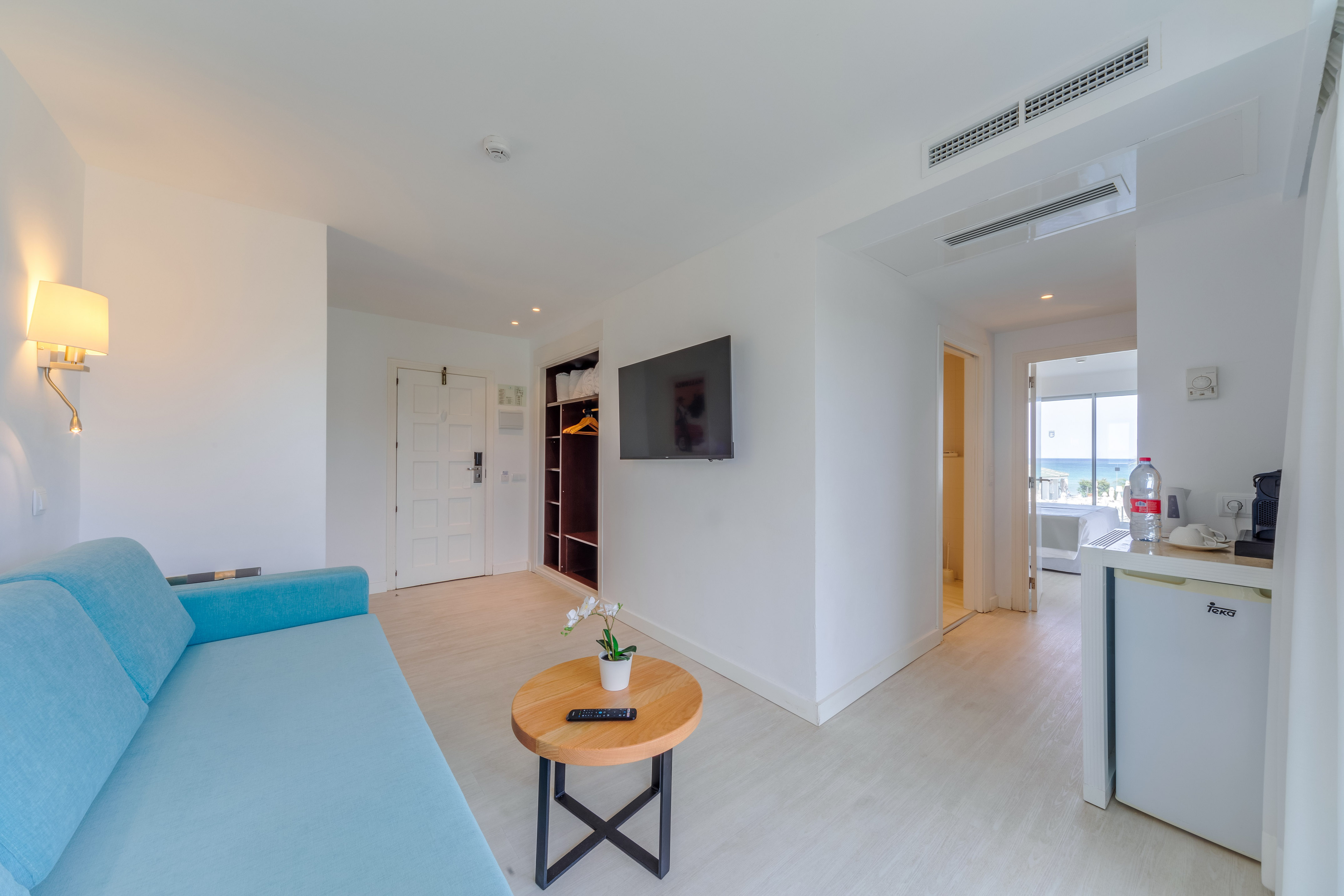 a room with a couch and a table