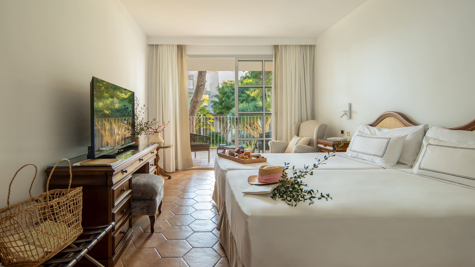 a room with a television and a bed