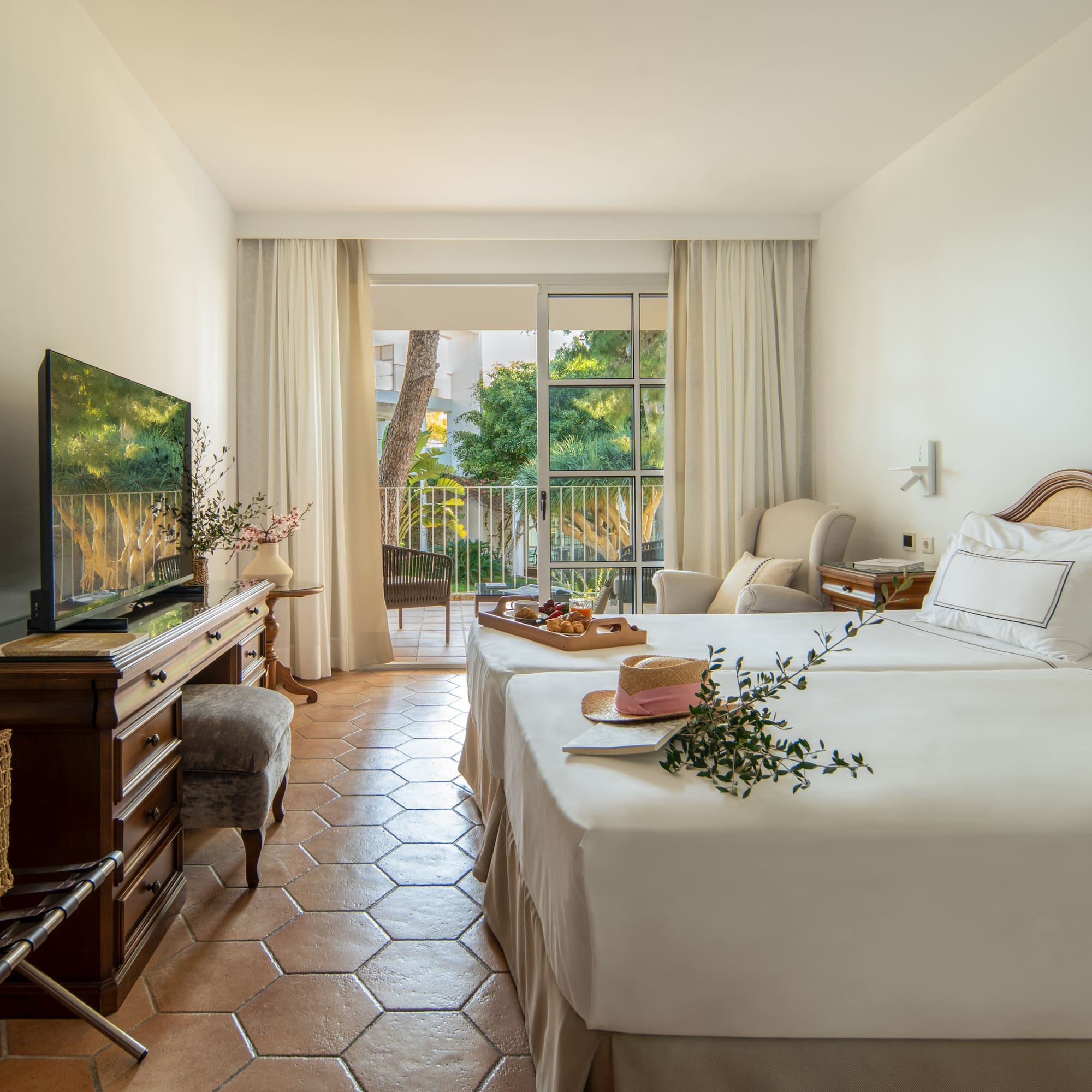 a room with a television and a bed