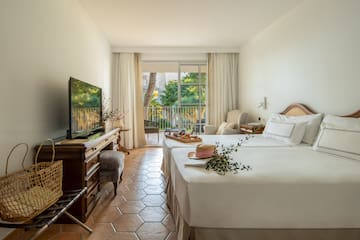 a room with a television and a bed