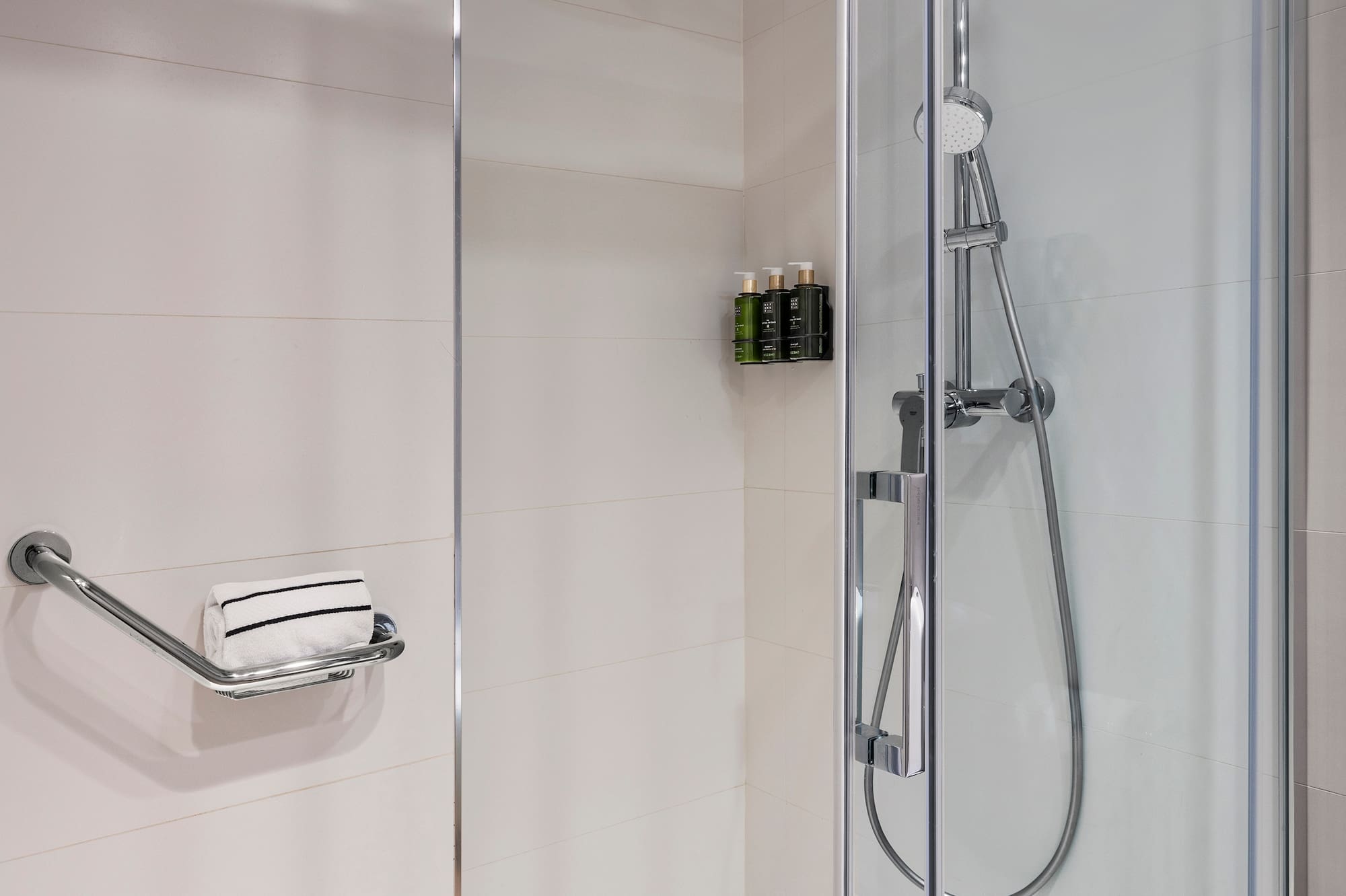 a shower with a glass door