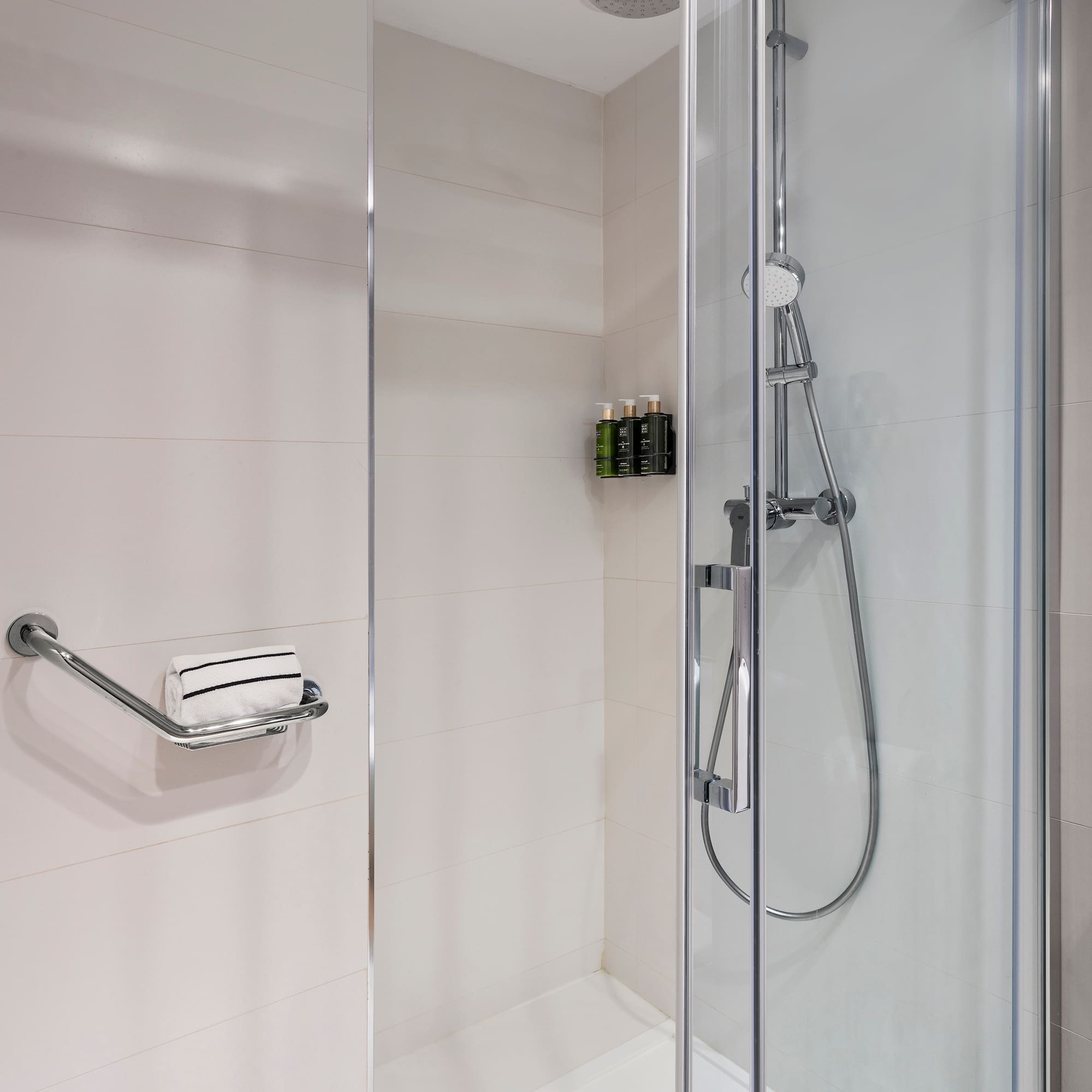 a shower with a glass door