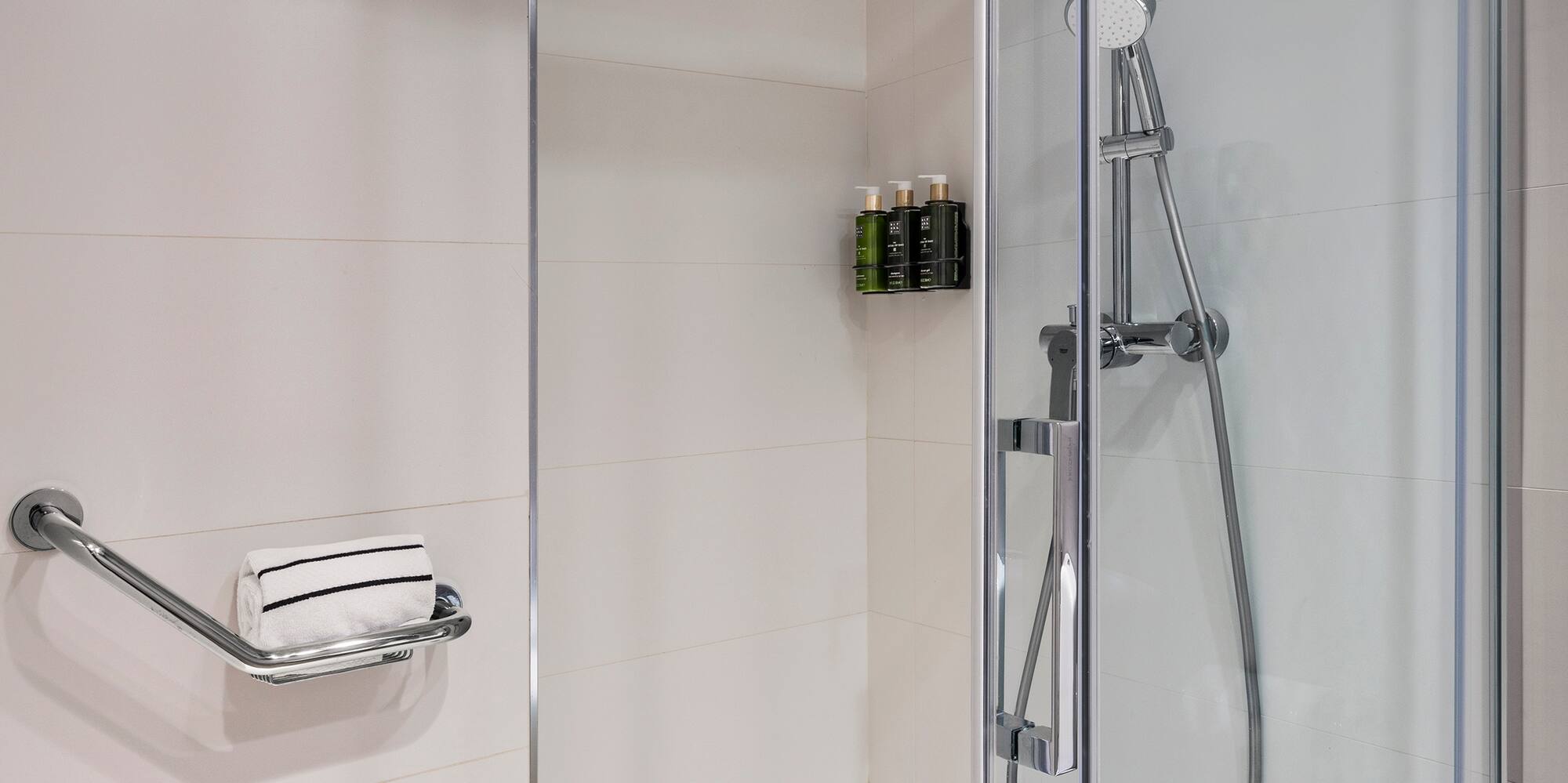 a shower with a glass door