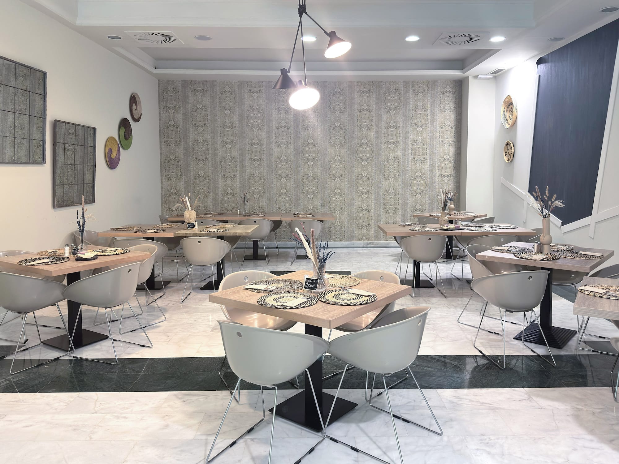 a room with tables and chairs