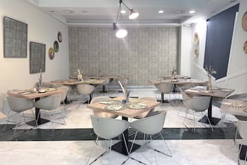 a room with tables and chairs