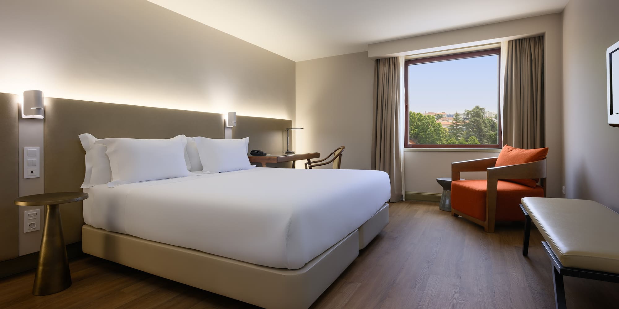 a room with a bed and a chair