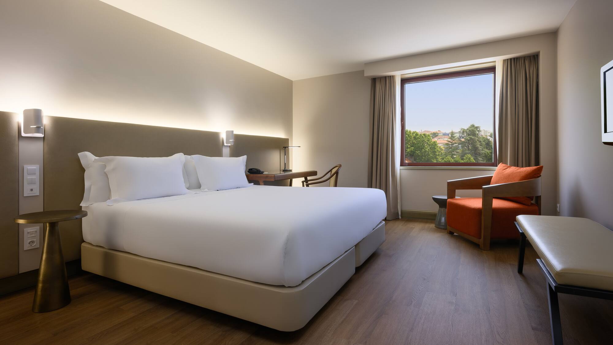 a room with a bed and a chair