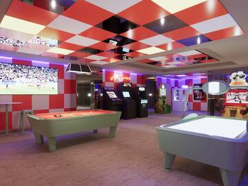 a room with a pool table and arcade games