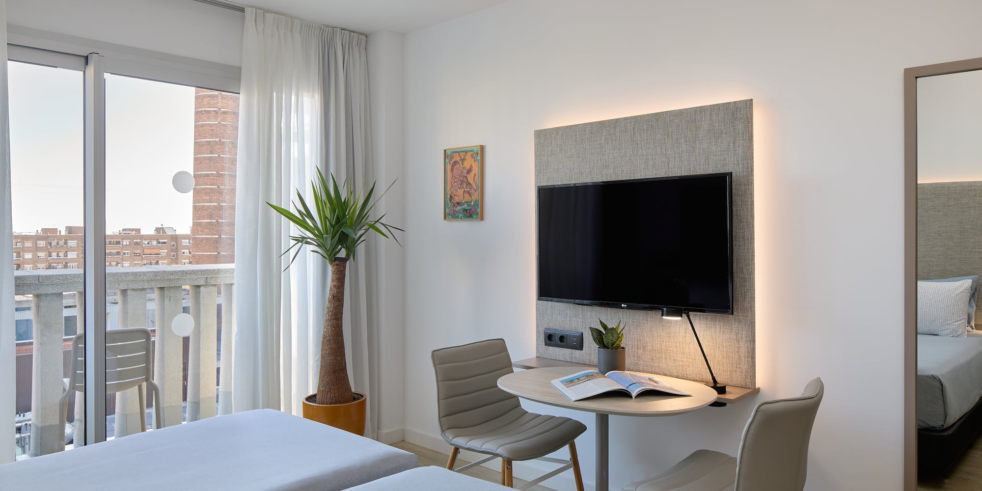 a room with a television and a table