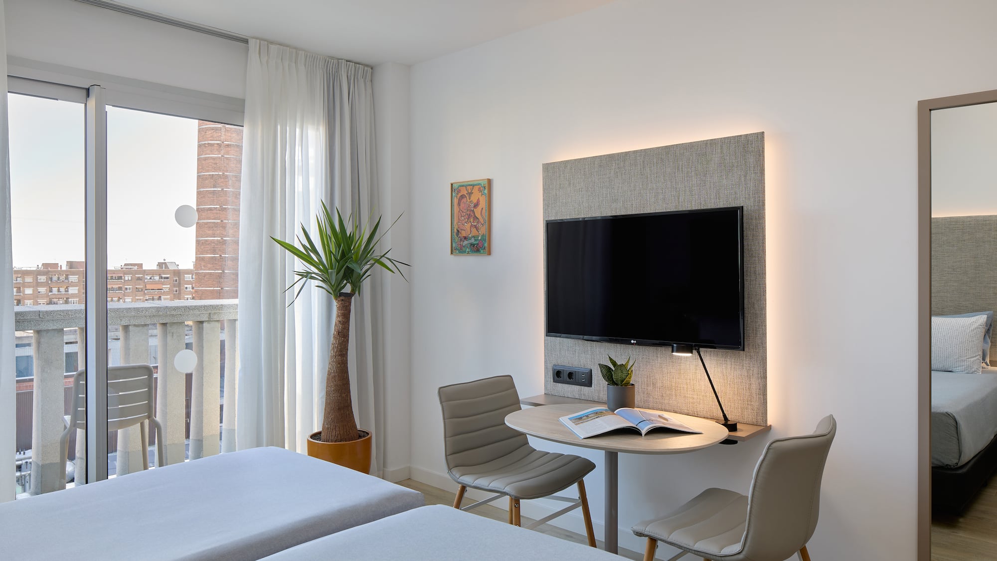 a room with a television and a table