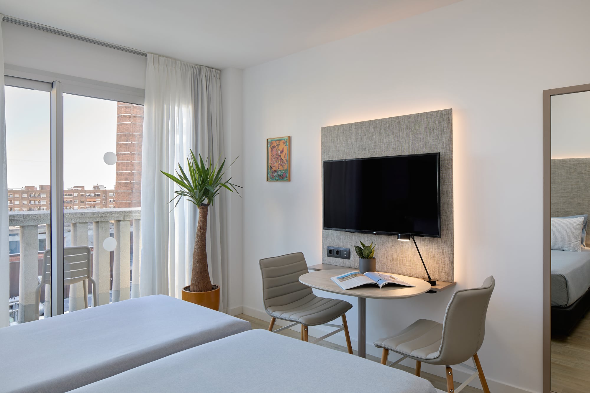 a room with a television and a table