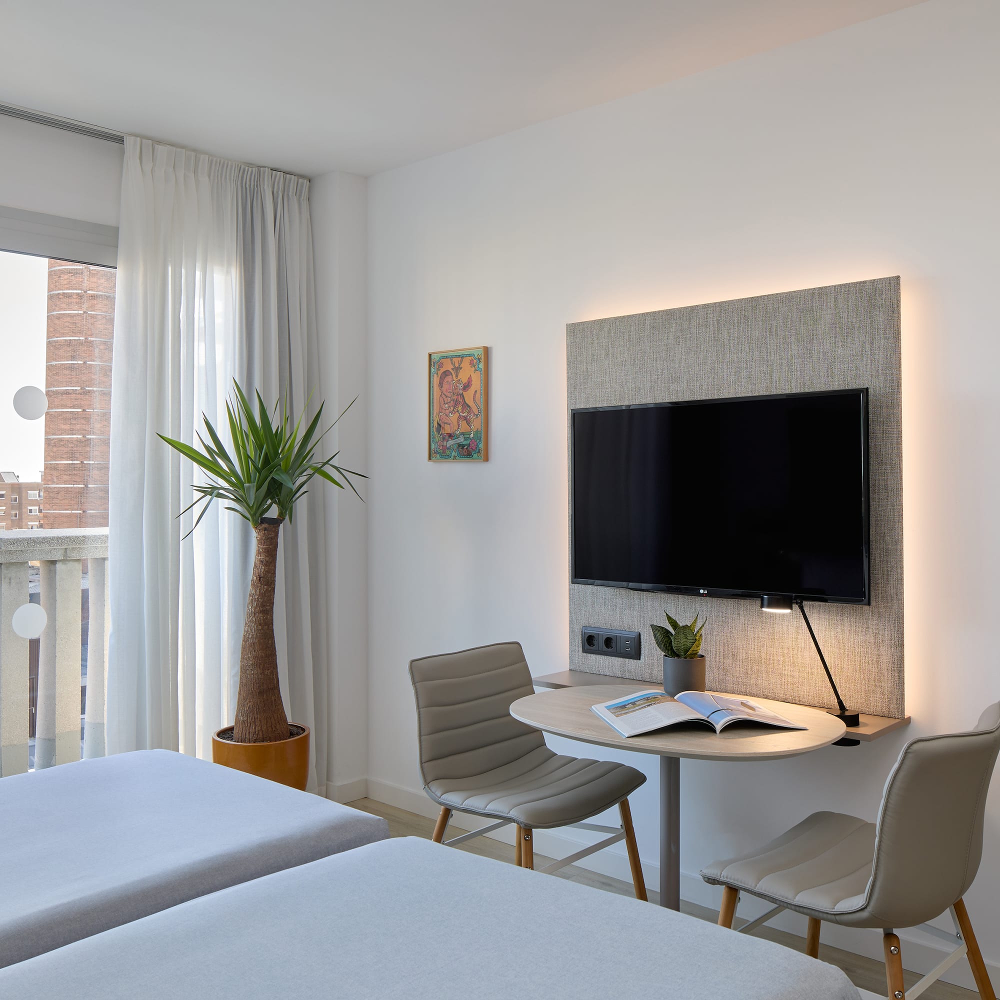 a room with a television and a table