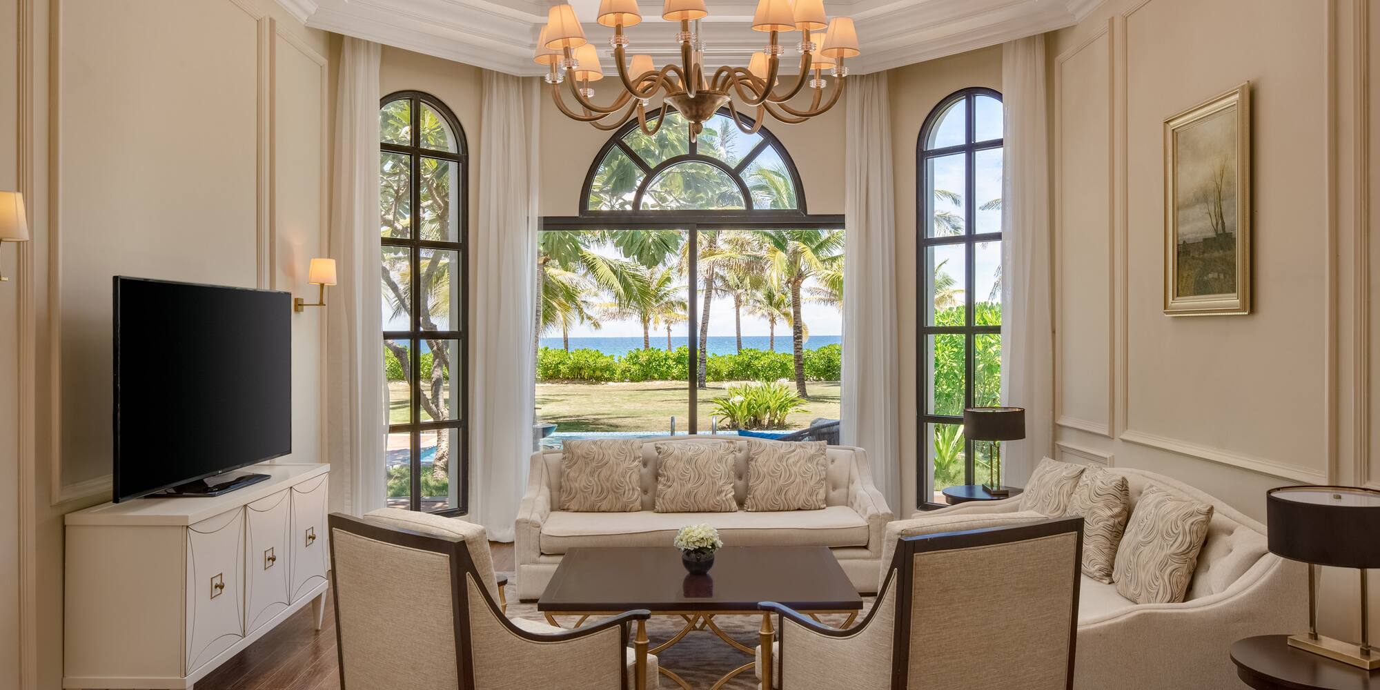 a living room with a television and a couch