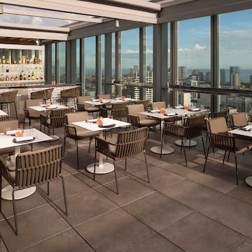 a restaurant with tables and chairs