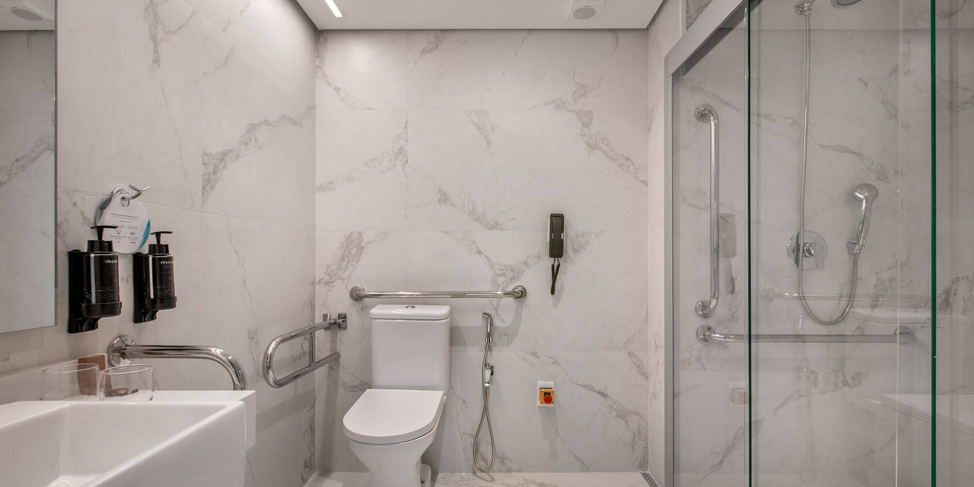 a bathroom with a toilet and sink