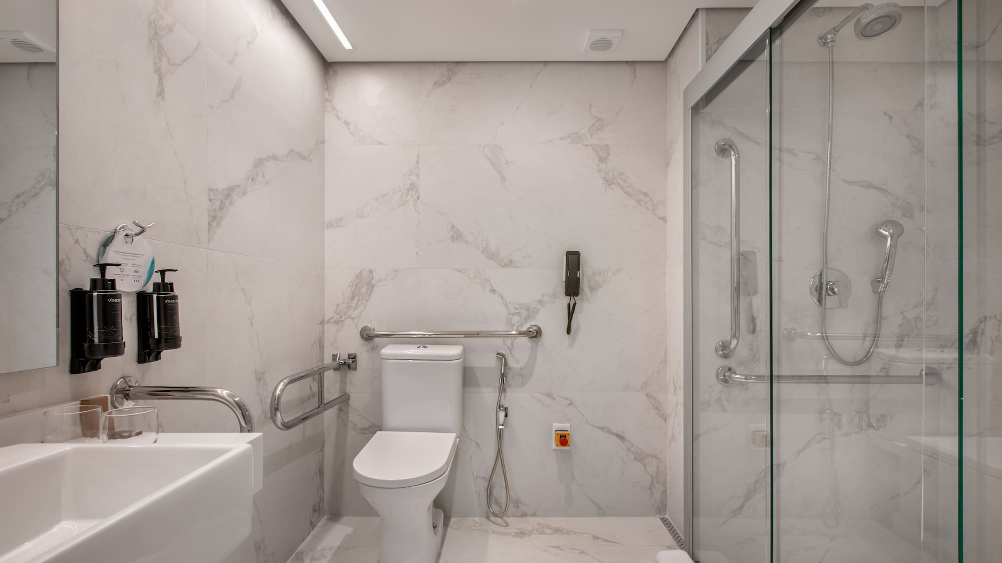 a bathroom with a toilet and sink