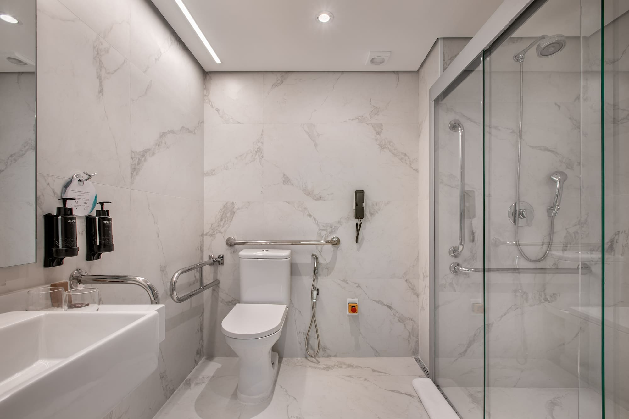 a bathroom with a toilet and sink