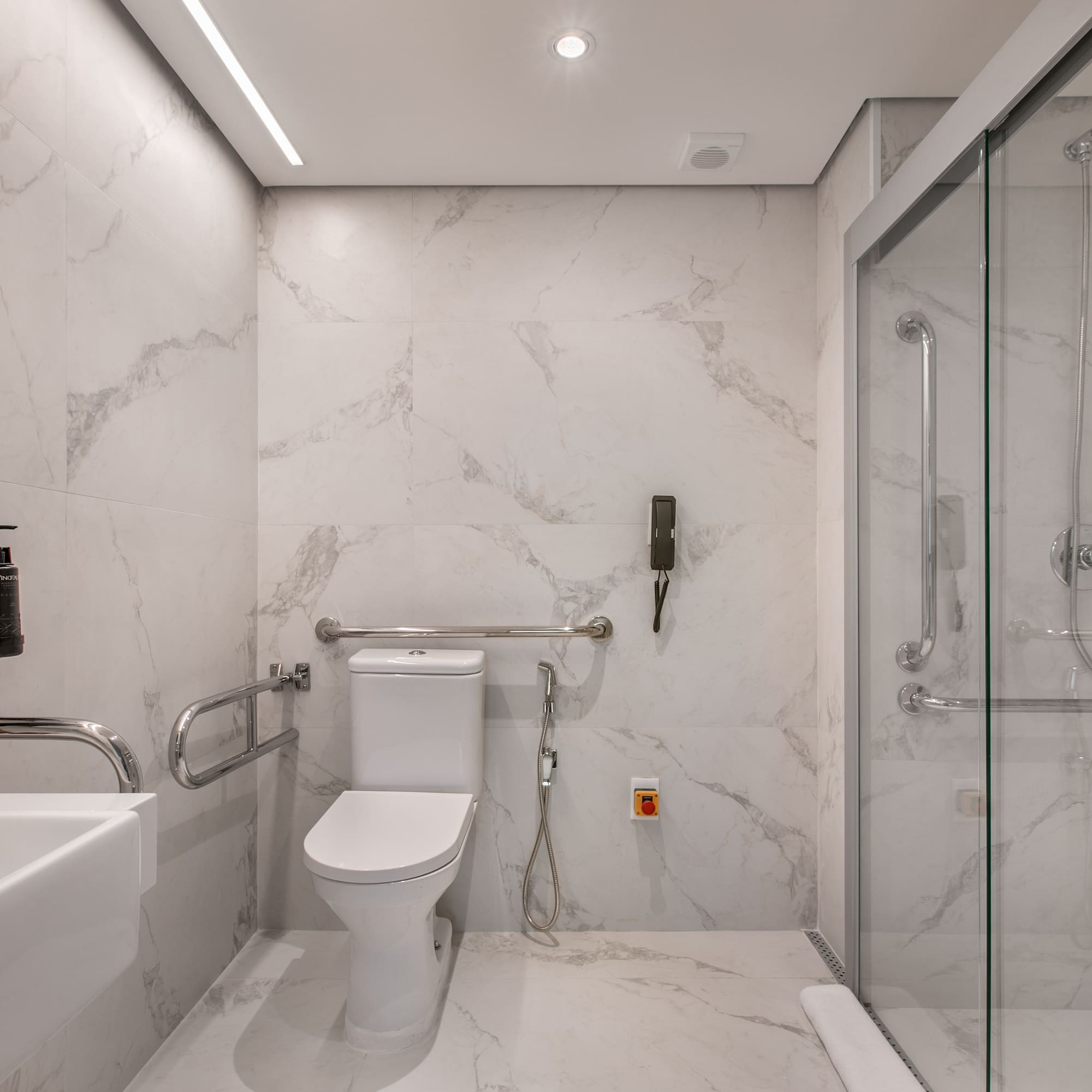 a bathroom with a toilet and sink